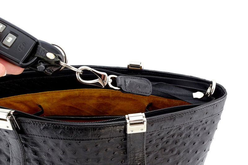 Black ostrich tote bag with nickel fittings outside view showing how keys attach to inside key holder