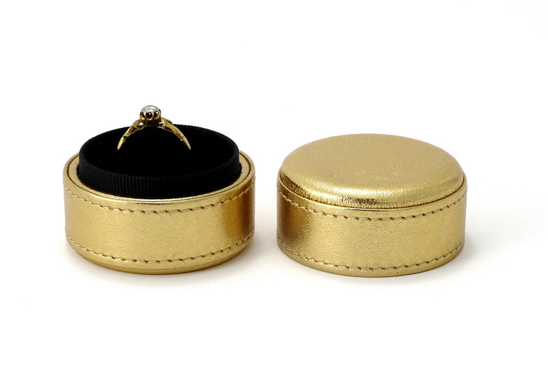 Ring Box round  Gold metallic sheep skin leather open showing with ring