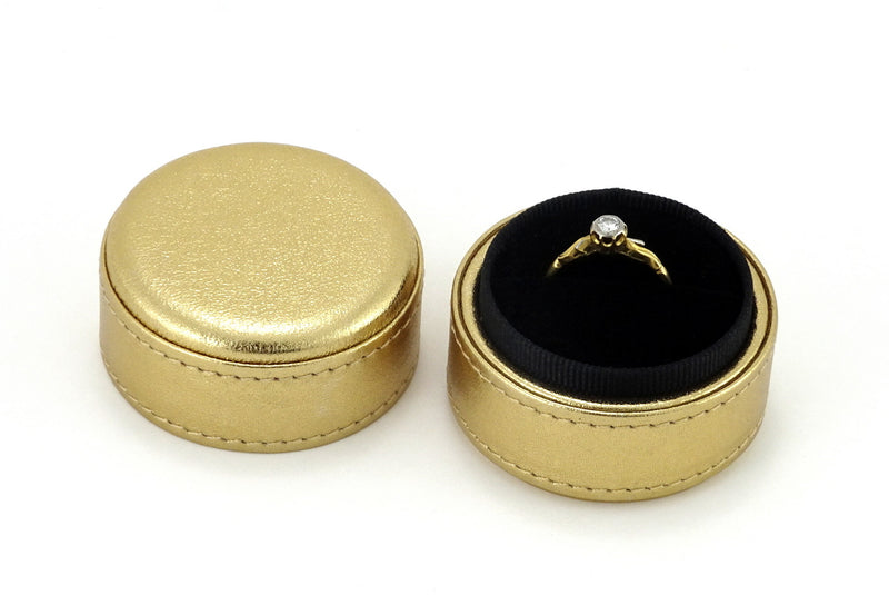 Ring Box round  Gold metallic sheep skin leather lid off shown with ring