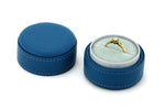 Ring Box round  Azure blue leather lid off showing ring