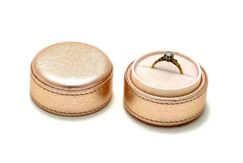 Ring Box round  Pink metallic sheep skin leather lid off showing ring