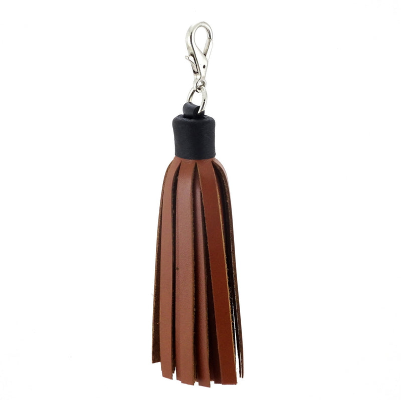 Tassels leather tan with a black cap