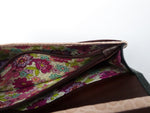 Caitlin  Forest green leather pink infinity knot detail ladies purse showing coin zip section
