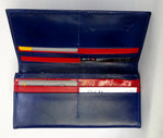 Caitlin  Royal blue leather with rojo ostrich leg detail ladies purse showing inside in use
