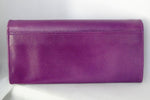Caitlin  Purple leather red strap buckle stud detail ladies purse back pocket view