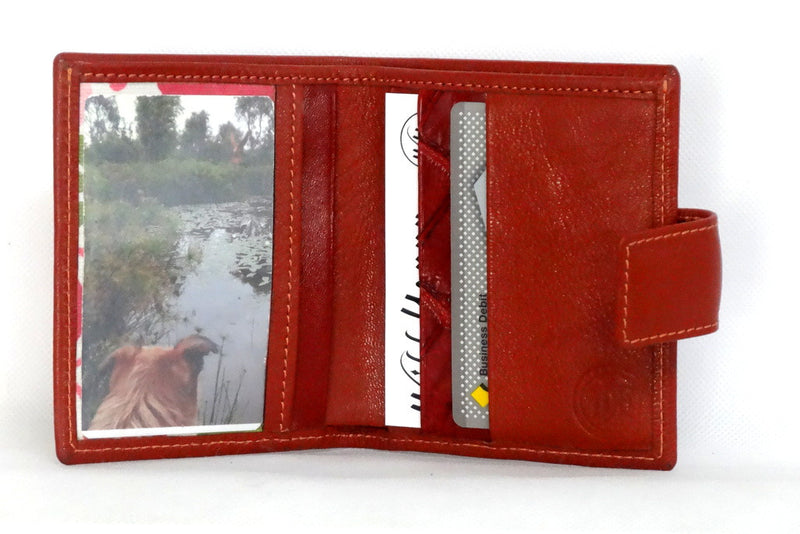 Christine  Rust lightly textured leather small ladies purse wallet inside picture window