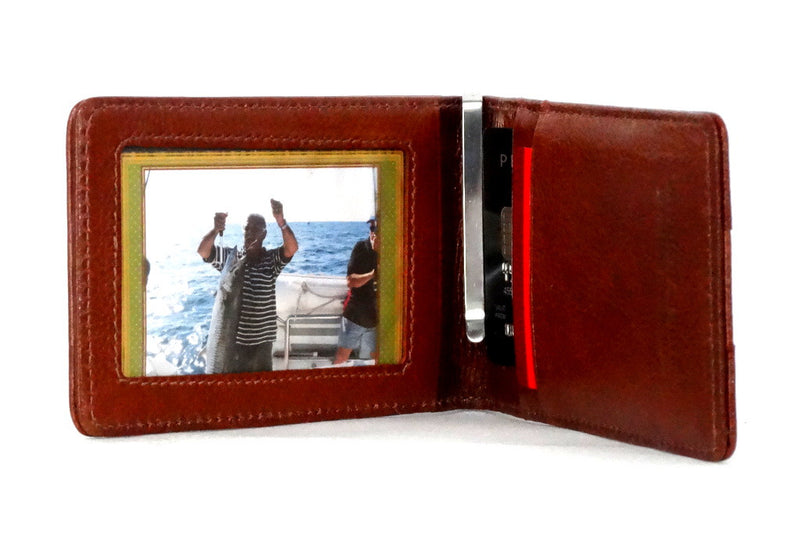 Rusty tan leather bill fold wallet inside view picture window and credit card pockets in use