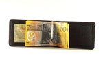 Bill fold wallet inside view black leather showing with notes in money clip