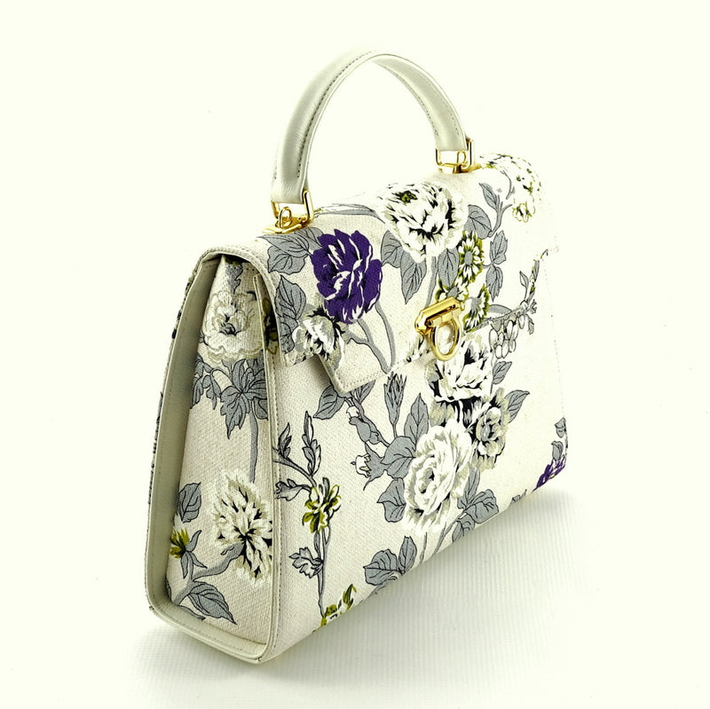 Handbag -traditional - (Joan) Floral canvas & leather - gold fittings showing front view fron the side gusset view