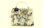 Handbag -traditional - (Joan) Floral canvas & leather - gold fittings - front view with shoulder strap attached
