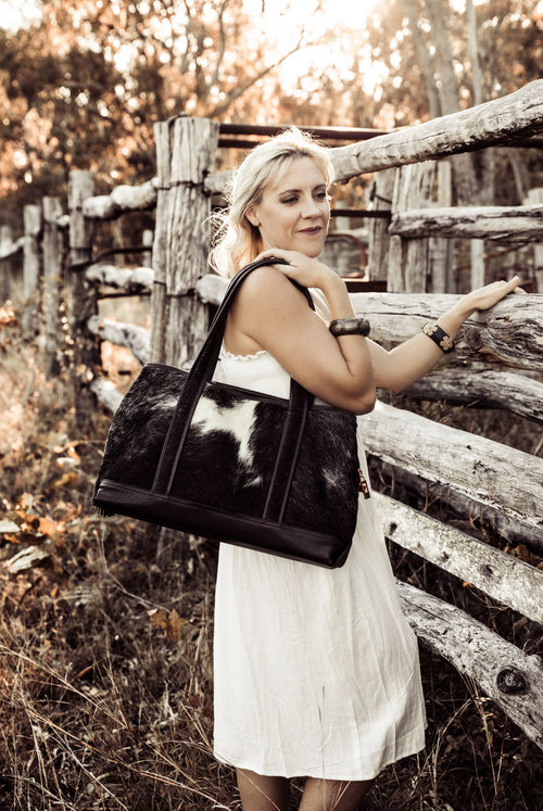 Felicity  Black & White hair on cow hide dark brown leather tote bag showen on model
